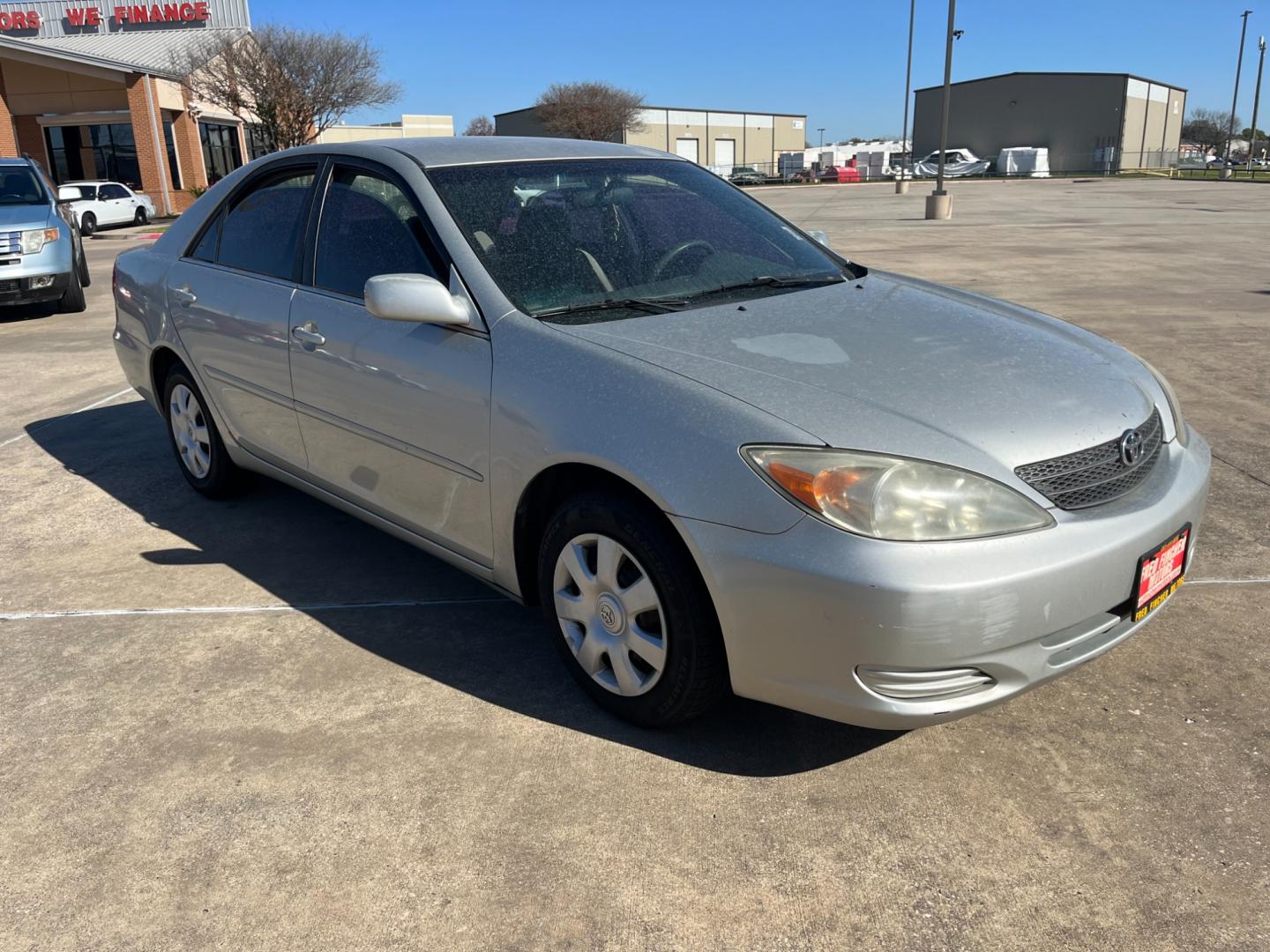 2002 SILVER /gray Toyota Camry LE (4T1BE32K72U) with an 2.4L L4 DOHC 16V engine, Automatic transmission, located at 14700 Tomball Parkway 249, Houston, TX, 77086, (281) 444-2200, 29.928619, -95.504074 - Photo#0